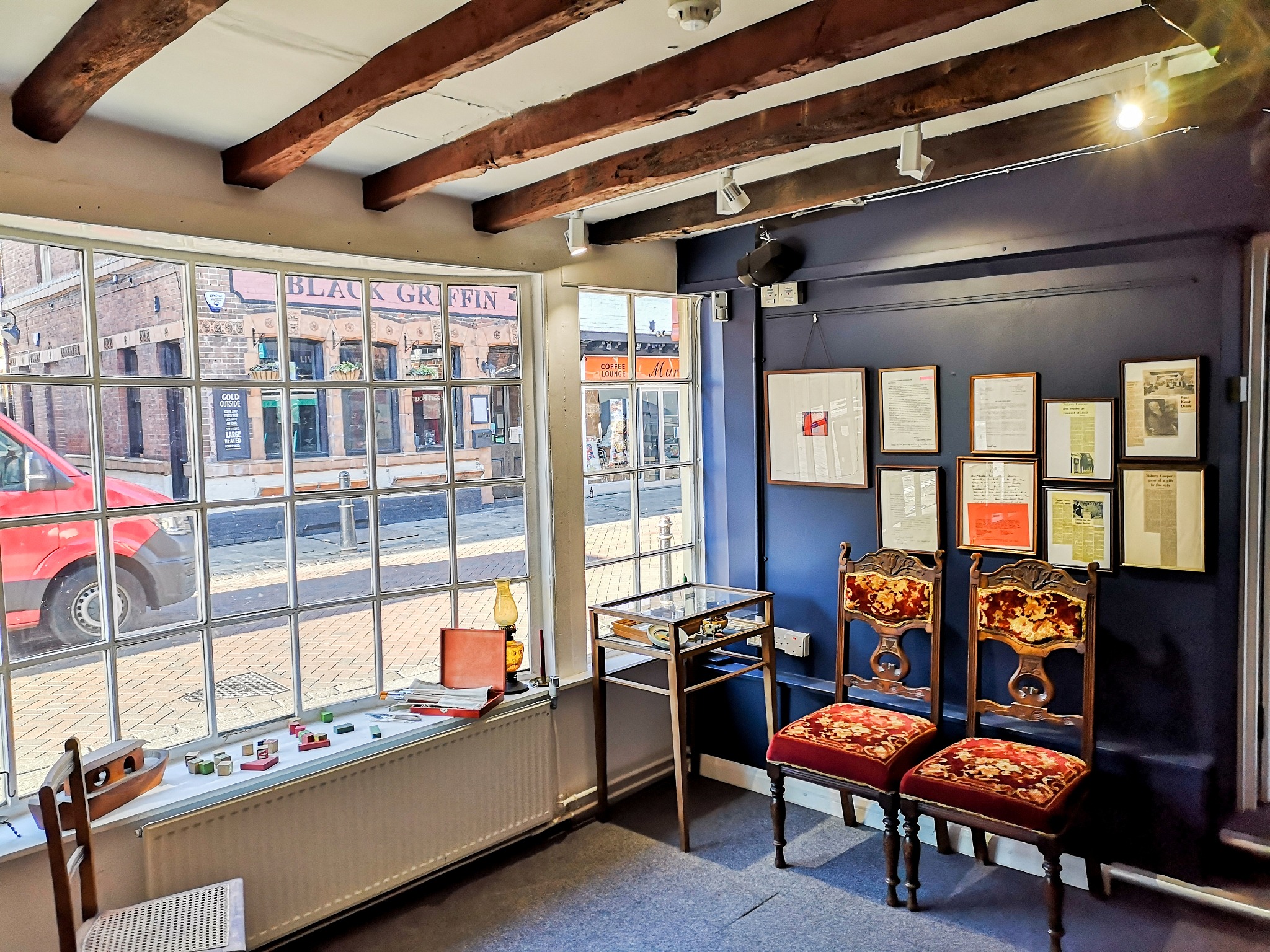 An image of the front room of the Sidney Cooper Gallery in Canterbury, dressed to look like Sidney Cooper's original living. 